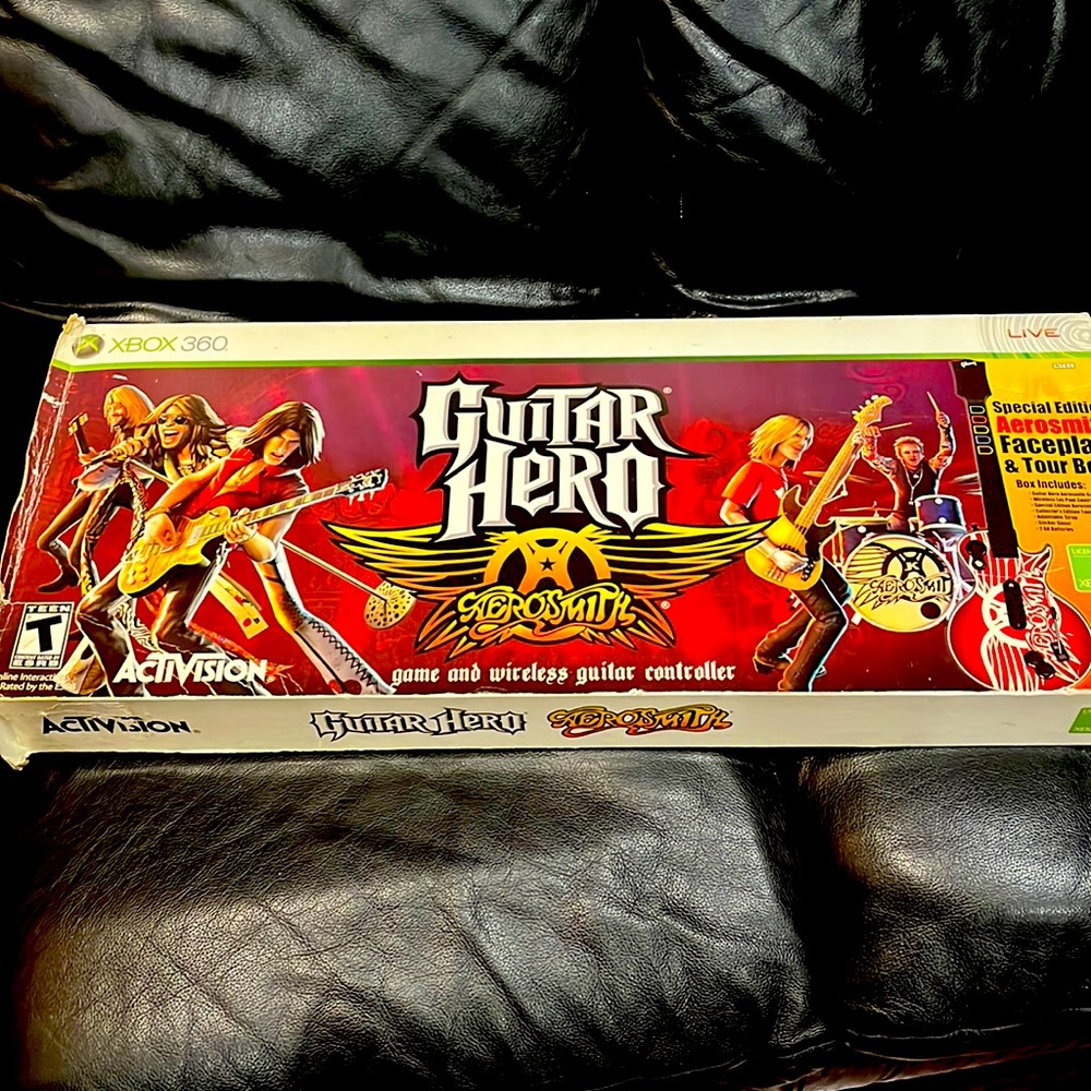 Guitar Hero ( game and wireless guitar controller)